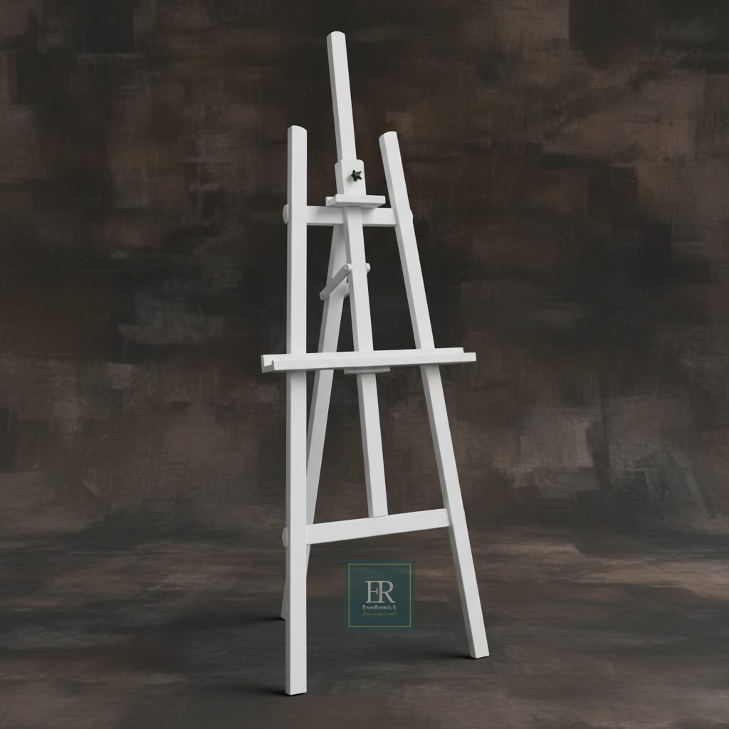 Rent or similar products at EventRentals.lk White wooden artist's easel on a dark, smudged brown and grey background, with the EventRentals.lk logo watermark.
