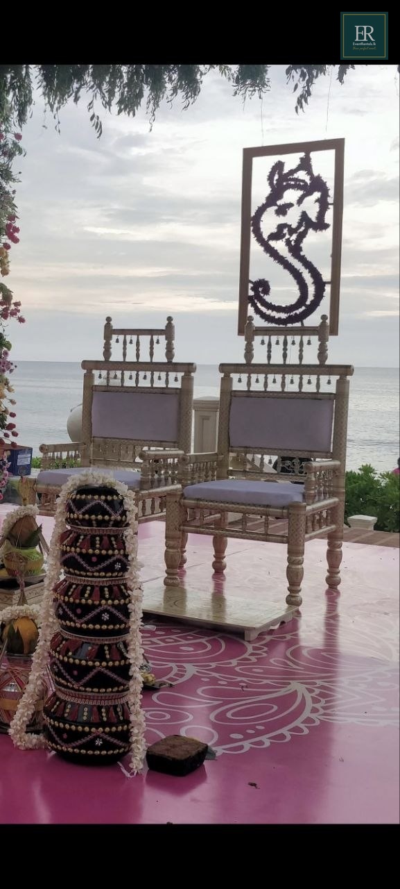 Rent or similar products at EventRentals.lk Traditional bride and groom throne chairs closeup carved wood lavender cushions wedding rental EventRentals