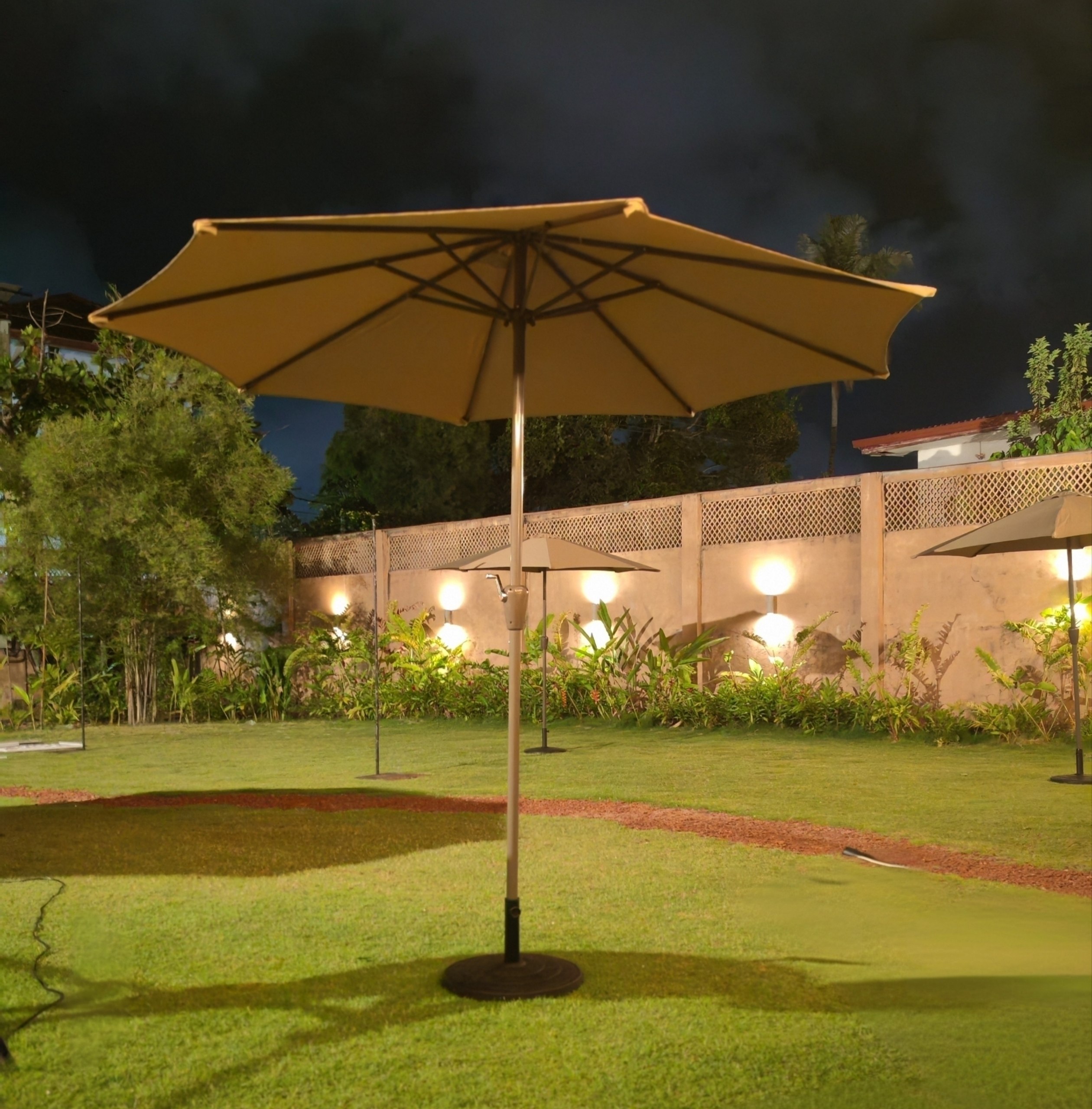 Rent or similar products at EventRentals.lk Garden Umbrella for rent - outdoor night view