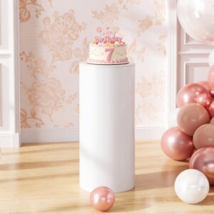 White 30-inch cylindrical cake pillar supporting a cake at an event in Colombo